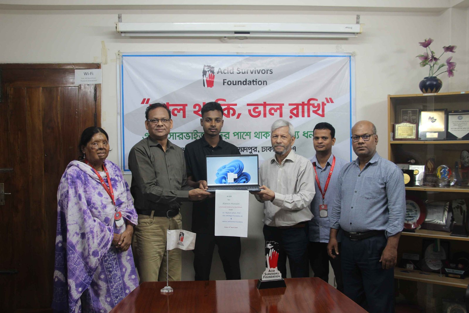 Laptop handover to AL Amin Hossain
